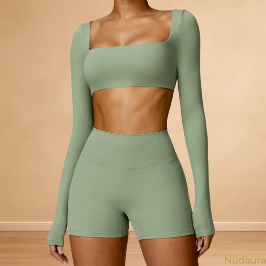 Nüdaura ContourFlow Seamless Suit – Soft Green color, front view pose.