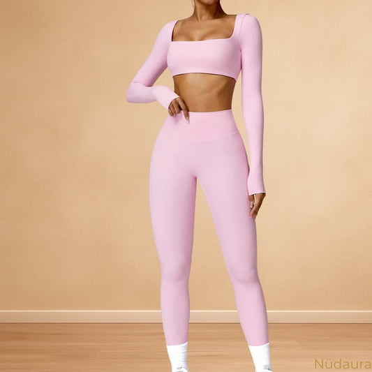 Nüdaura ContourFlow Seamless Suit – Light Pink color, front pose.