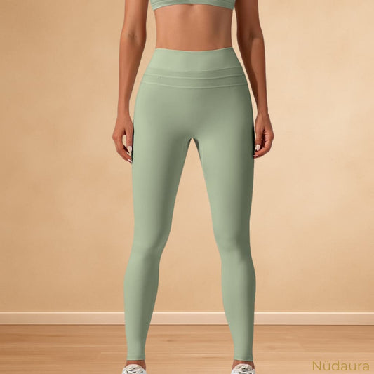 Nüdaura NudeFeel Sculpt Leggings – Muted Green color, front stance pose.