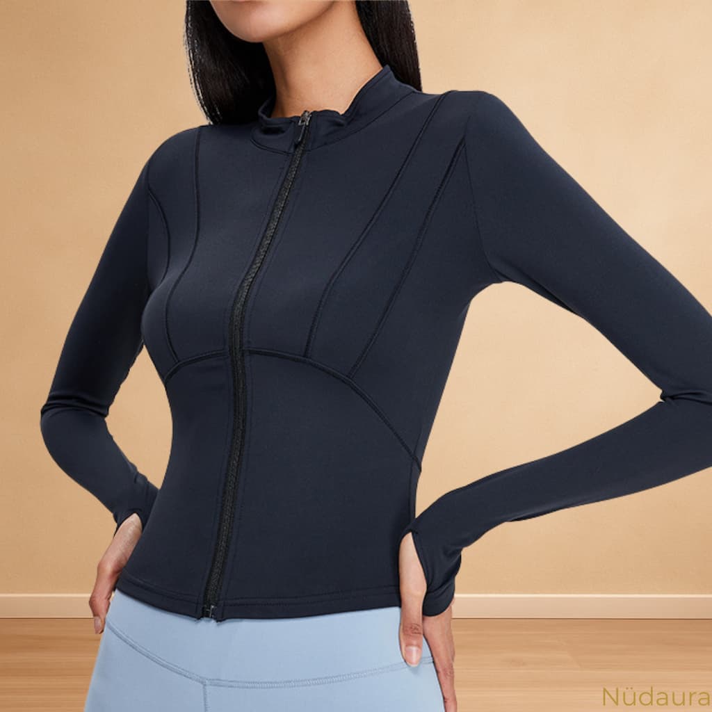 Nüdaura ThermalFlow Jacket – Classic Black color, front hands waist pose.