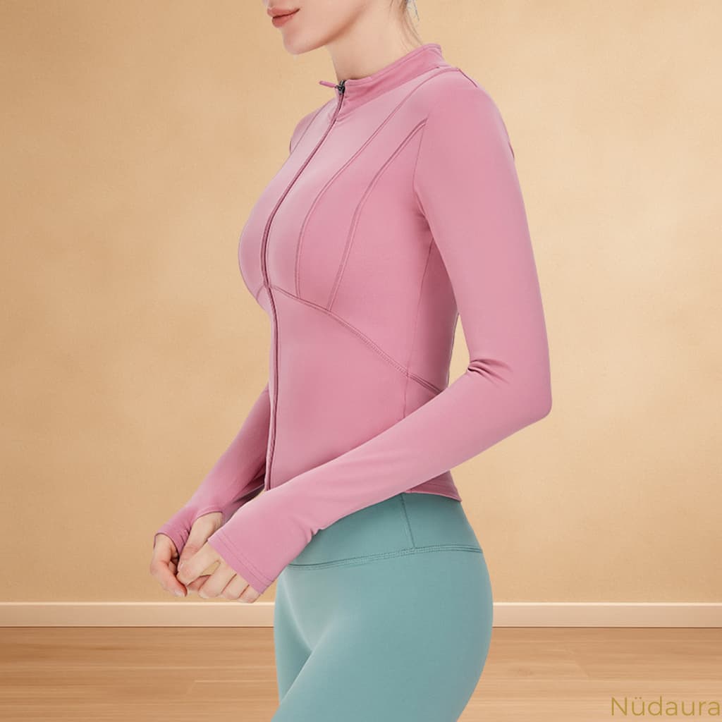 Nüdaura ThermalFlow Jacket – Soft Pink color, side profile pose.