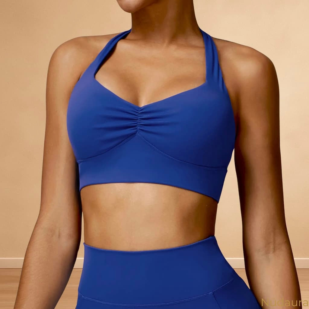 Nüdaura AeroForm Tank – Bold Blue color, front closeup pose.