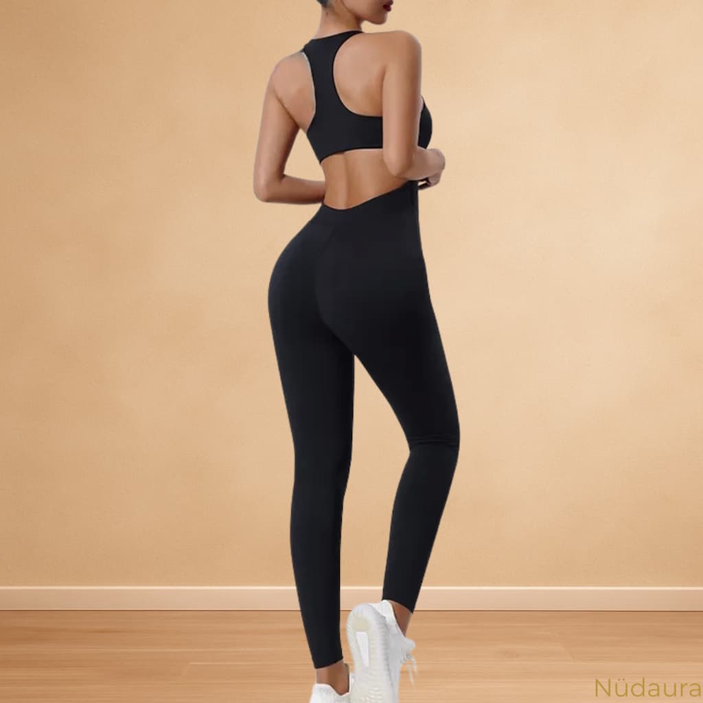 Nüdaura OneFlow Jumpsuit – Classic Black color, back angle pose.